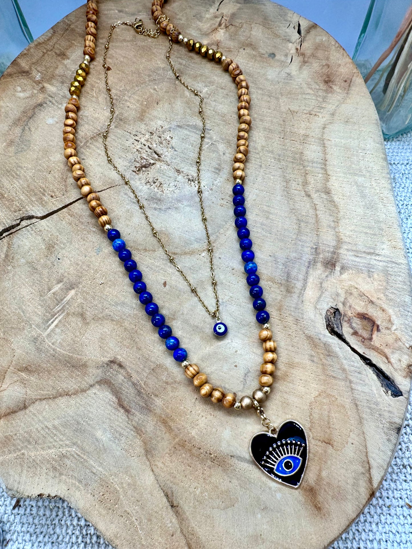Colliers bohème chic thème œil de protection. Bois, lapis lazuli et acier inoxydable