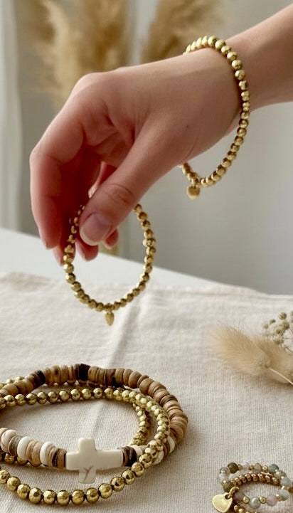 Collection Printemps 2026 – Bracelets élastiques en bois & pyrite, bagues en acier inoxydable et pierres naturelles